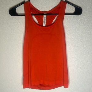 Lululemon burnt orange, cropped swiftly tech racer back tank top